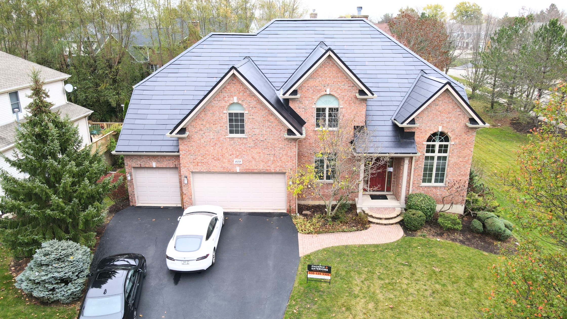 Phoenix Exteriors LLC team and workplace 3
